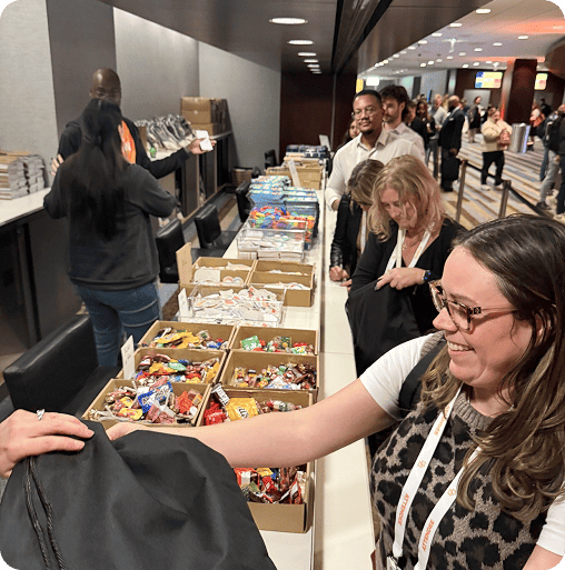 RelFest Chicago 2025 - Attendees packing kits for students